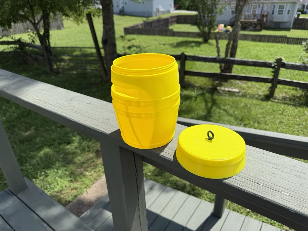 Yellow barrel open on rail